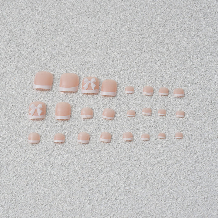 Artificial nail set with romantic bow motifs Bowlift