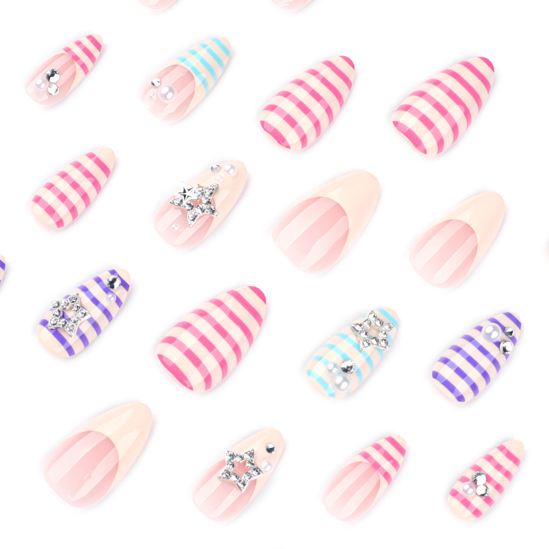 Artistic acrylic stiletto nails with glitter and star embellishments Bowlift