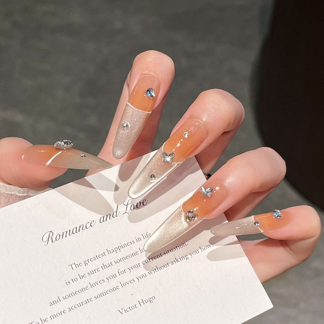 Elegant Press-On Nail Extensions with Gem Accents Bowlift
