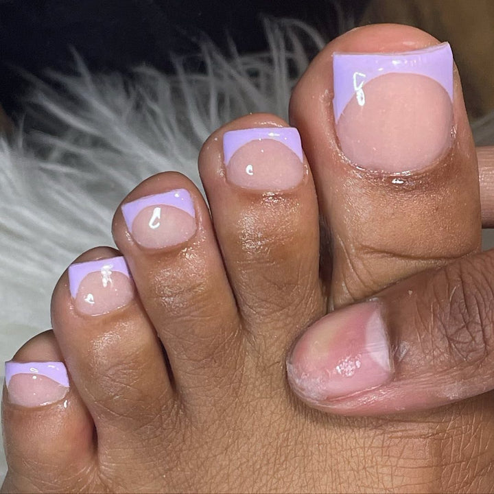Acrylic nail set with elegant French tips and high-gloss finish Bowlift