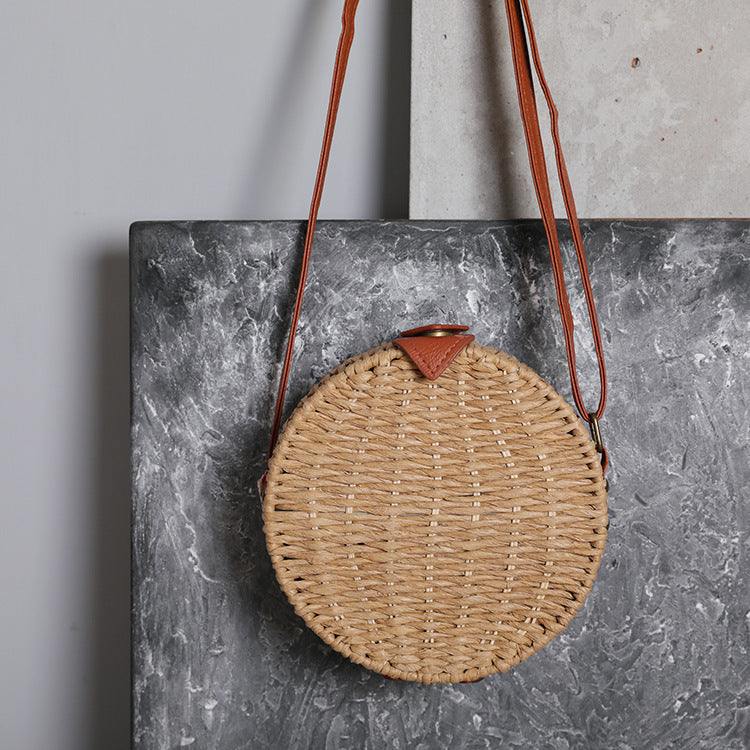 Round basket bag with leather accents Bowlift