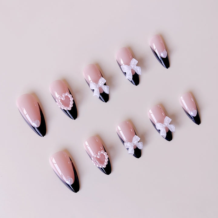Glamorous artificial nail tips with 3D bows and heart decorations Bowlift