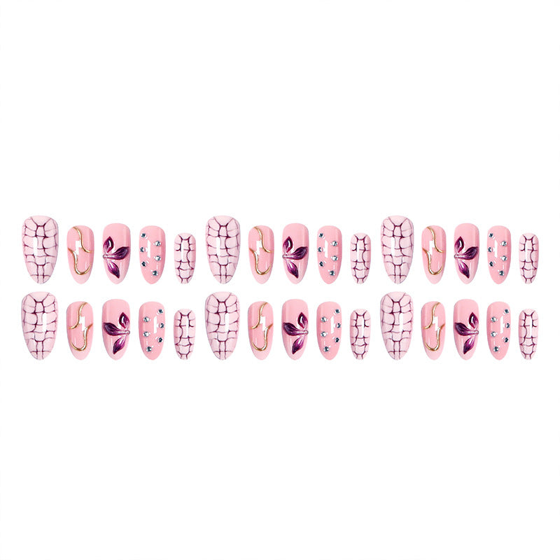 Acrylic nail set with glamorous design and sparkling accents Bowlift