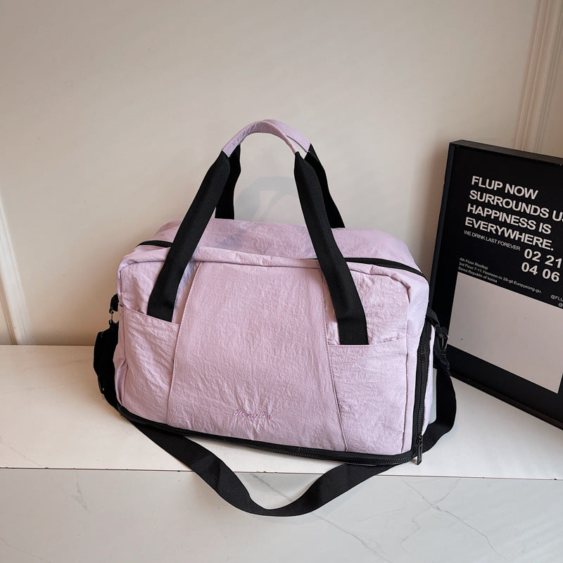 Sporty travel bag with practical outer pockets Bowlift