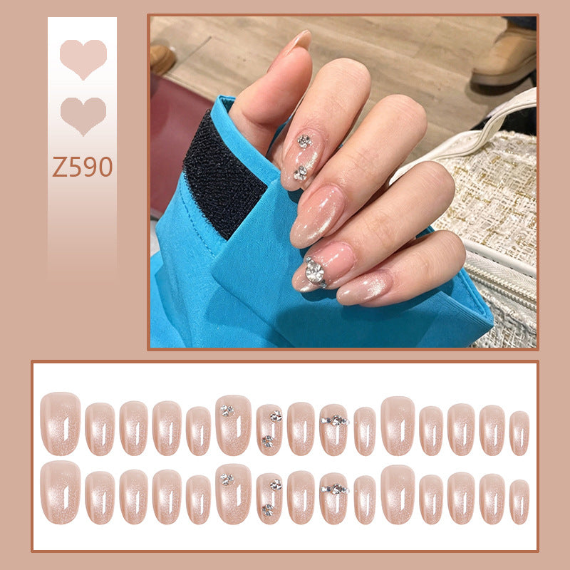Artificial nail set with elegant rhinestone embellishments Bowlift