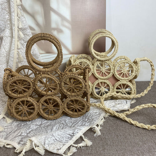 Artisan woven basket bag with striking wheel pattern Bowlift