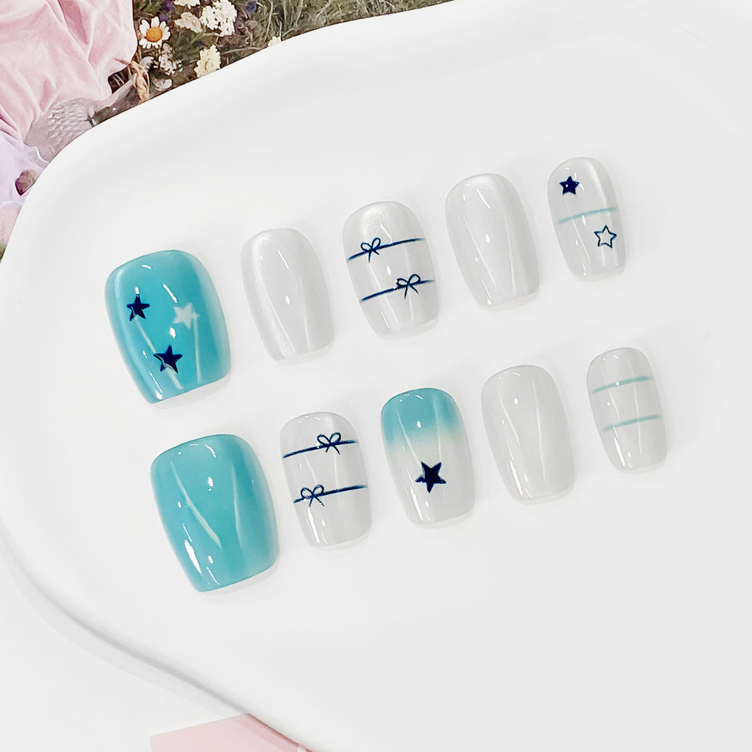 Artistic acrylic nails with star design Bowlift