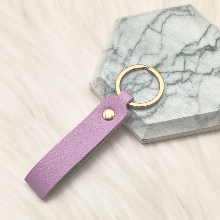 Unisex keychain made of high-quality synthetic leather with elegant metal embellishment Bowlift
