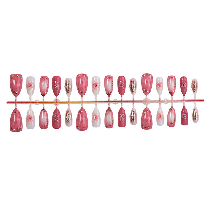 Artificial nail set with elegant flower and glitter details Bowlift