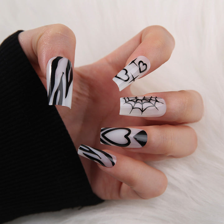 Artificial nails in modern Gothic style Bowlift