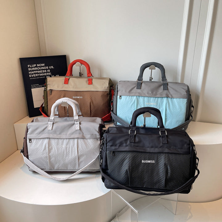 Sporty Travel Bag with Reinforced Shoulder Strap Bowlift