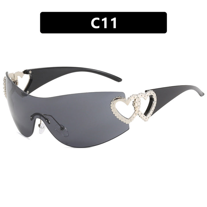 Ladies sporty sunglasses in trendy shield design with heart accents Bowlift