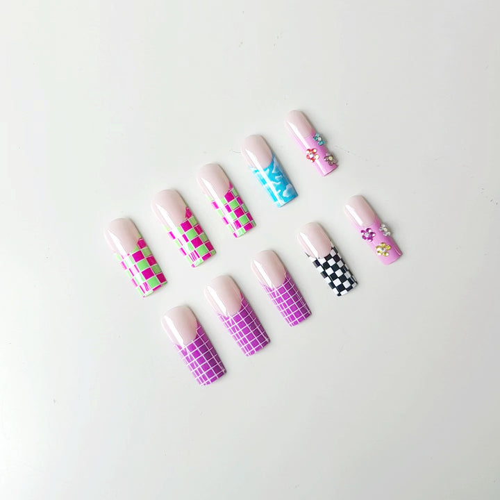 Nail art set with creative designs and shimmering accents Bowlift