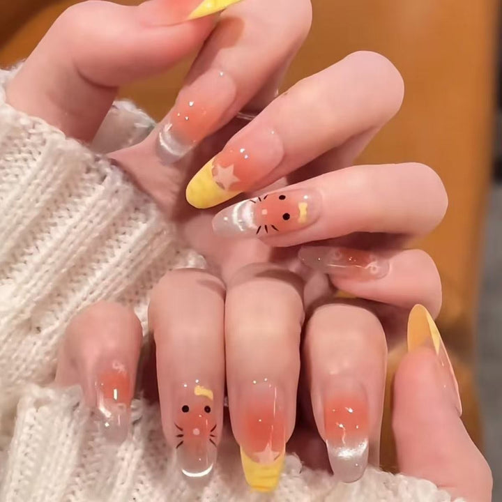 Artistic Press-On Nail Set with Bow and Gemstone Detail Bowlift