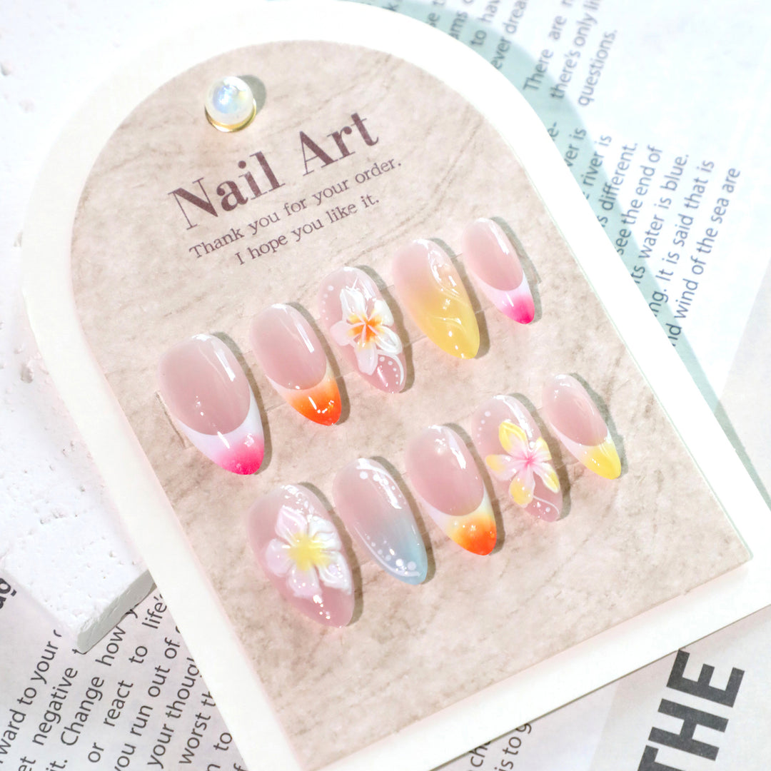 Artistic nail designs with floral accents and soft color gradients Bowlift