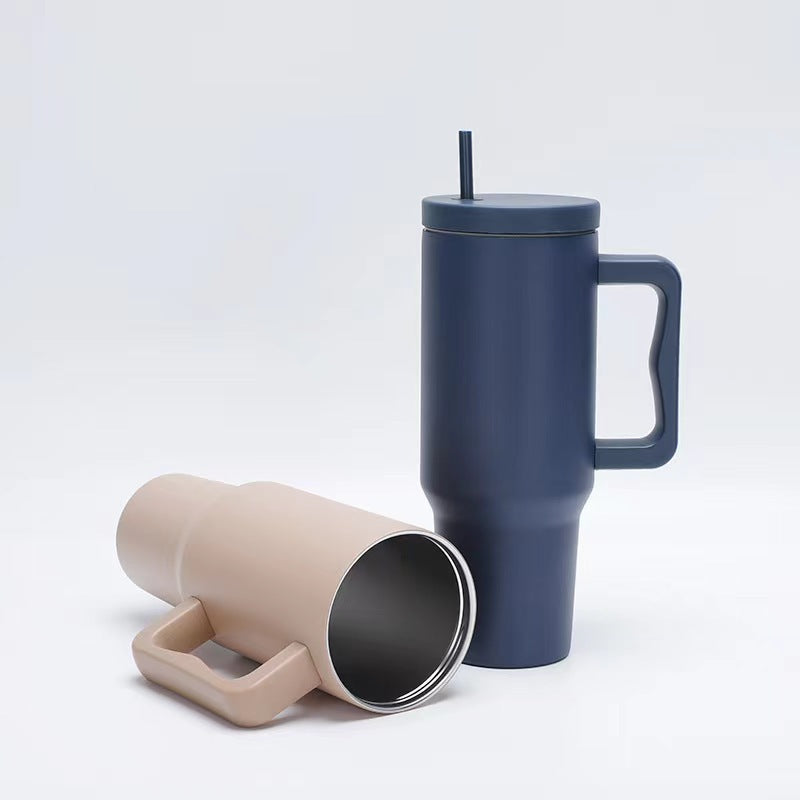 Women thermos cup with ergonomic handle and integrated straw Bowlift