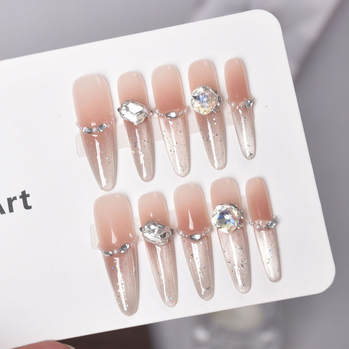 Artistic Stiletto Press-On Nail Art with Glimmering Accents Bowlift