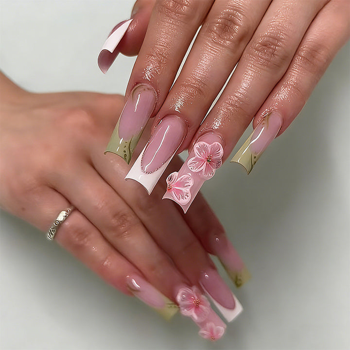 Artful nail tips with floral embellishments Bowlift