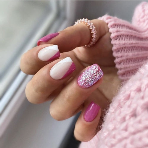 Artistic Nail Art with Glitter Accents and Ombre Design Bowlift