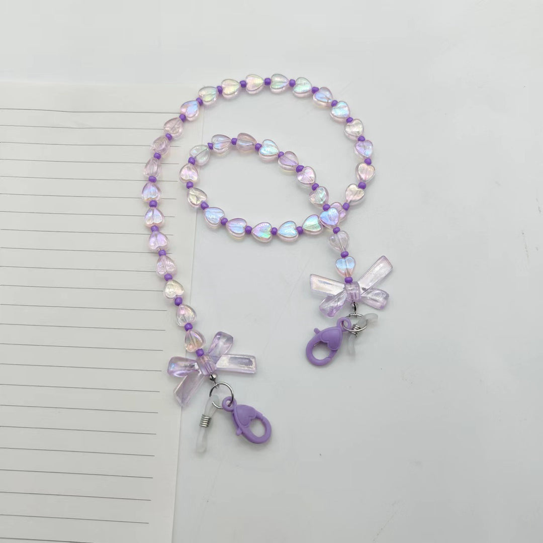 Fashionable glasses holder chain with heart and flower motifs Bowlift