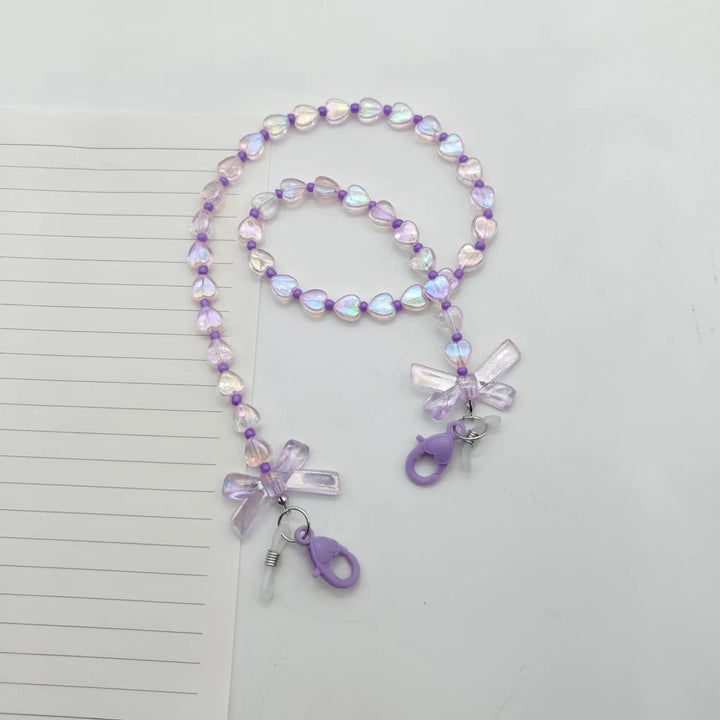 Fashionable glasses holder chain with heart and flower motifs Bowlift