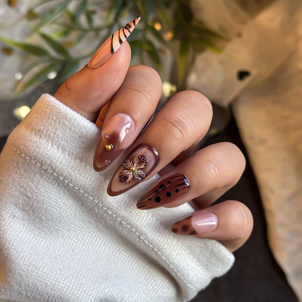 Artistic Press-On Nail Art Set with Floral and Abstract Design Bowlift