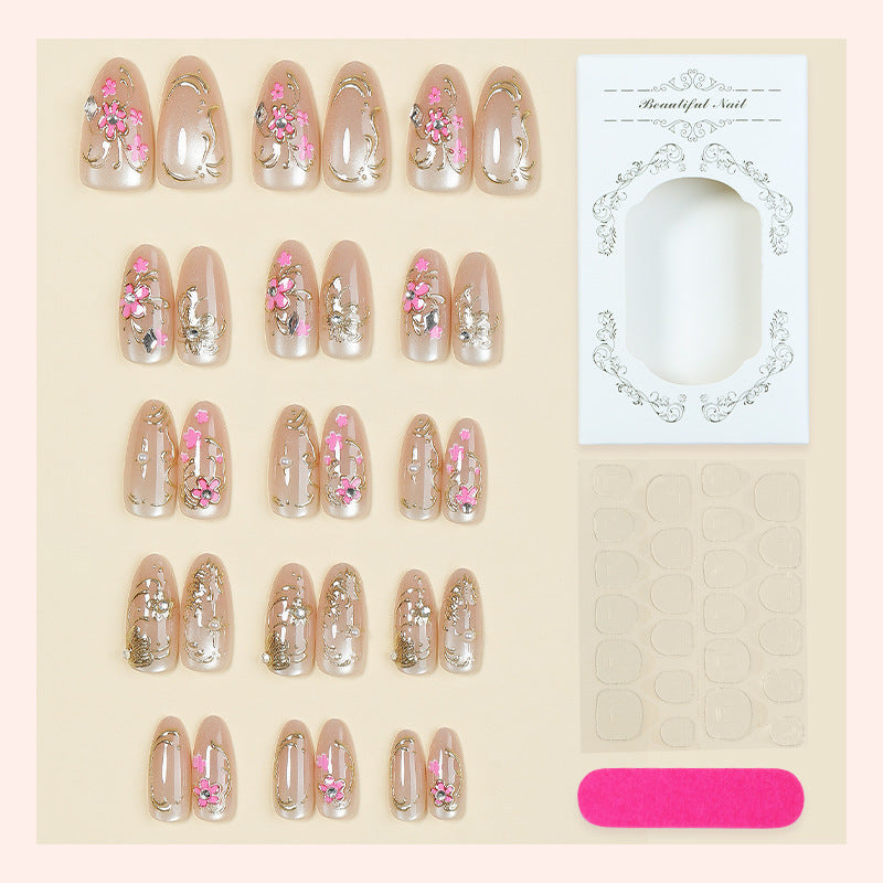 Nail art set with floral and golden details Bowlift