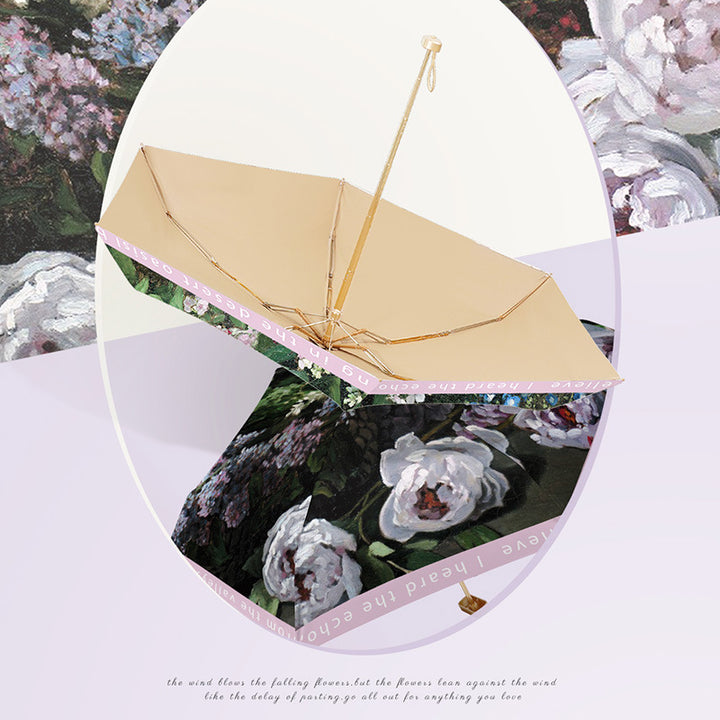 Ladies elegant folding umbrella with floral art design Bowlift
