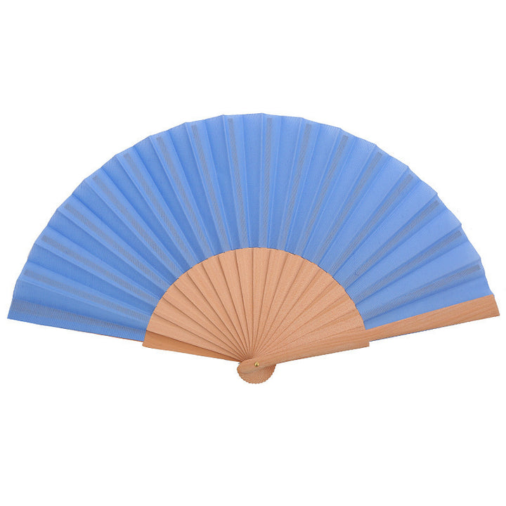 Ladies folding hand fan made of airy material with intricate folds Bowlift