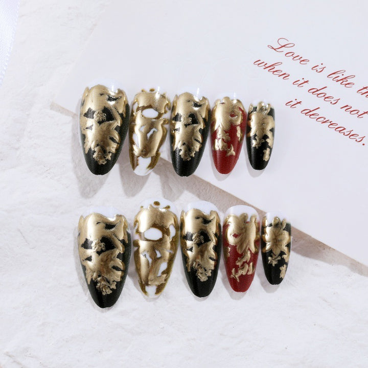 Elegant artificial nails with gold and black pattern Bowlift