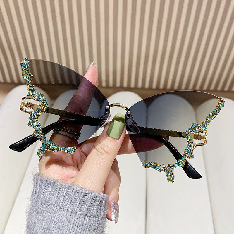 Women's extravagant sunglasses with sparkling butterfly design Bowlift
