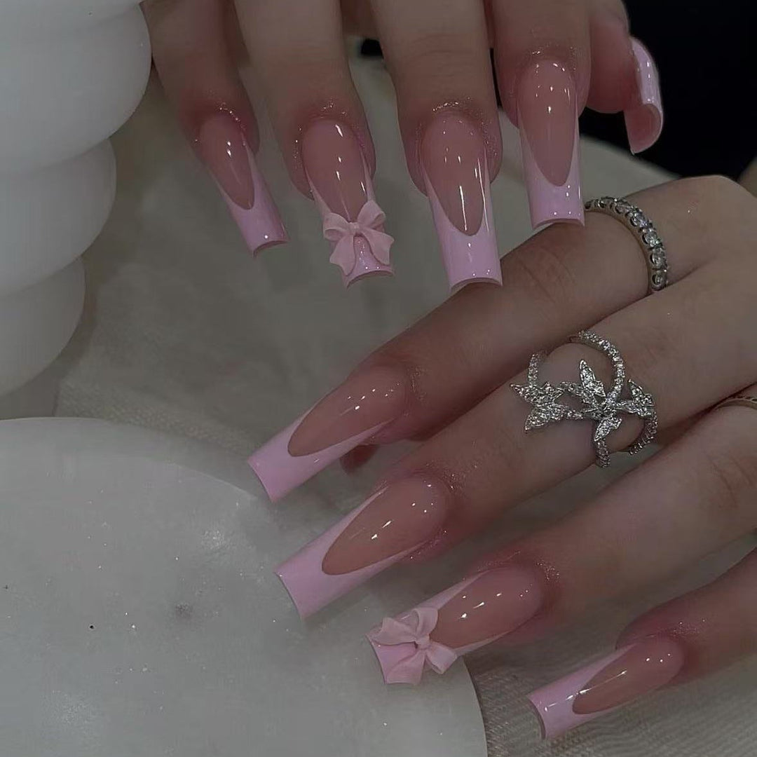 Artificial nail set with elegant tips and playful 3D design Bowlift