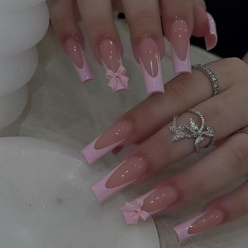 Artificial nail set with elegant tips and playful 3D design Bowlift