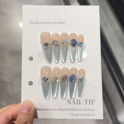 Glamorous artificial nails with sparkling stones Bowlift