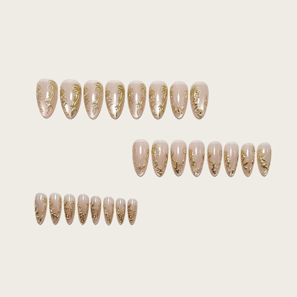 Exquisite artificial nails with golden decorations Bowlift