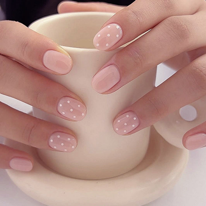 Artful Nail Art with Delicate Dot Design Bowlift
