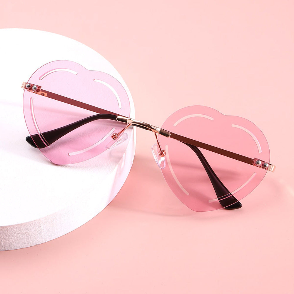 Women's Heart-Shaped Sunglasses with Stylish Metal Frame Bowlift