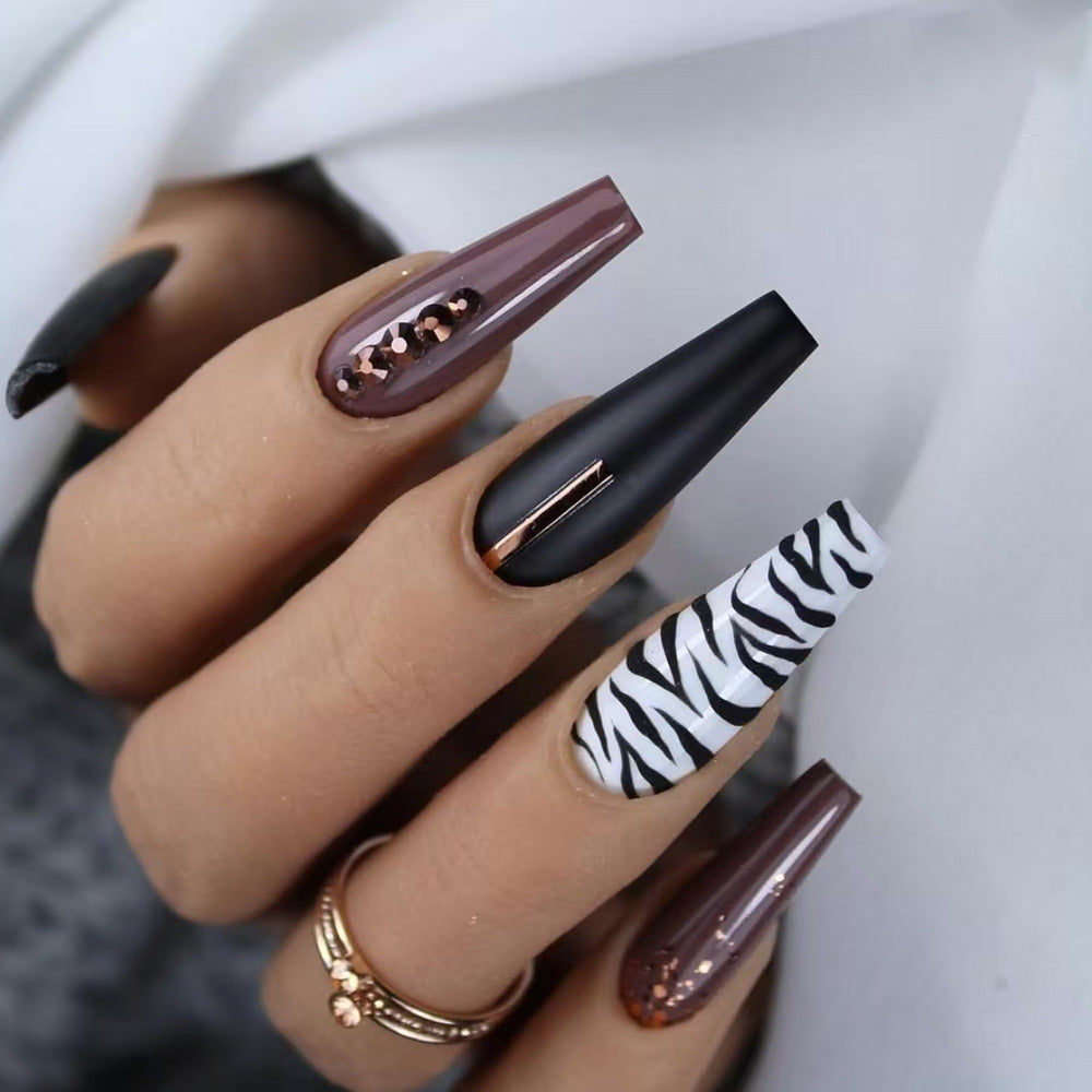 Artistic Stiletto Press-On Nail Art with Zebra Print Bowlift