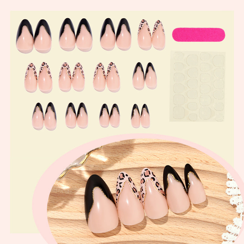 Stiletto Press-On Nail Set with Creative Leopard and Glossy Black Accents Bowlift
