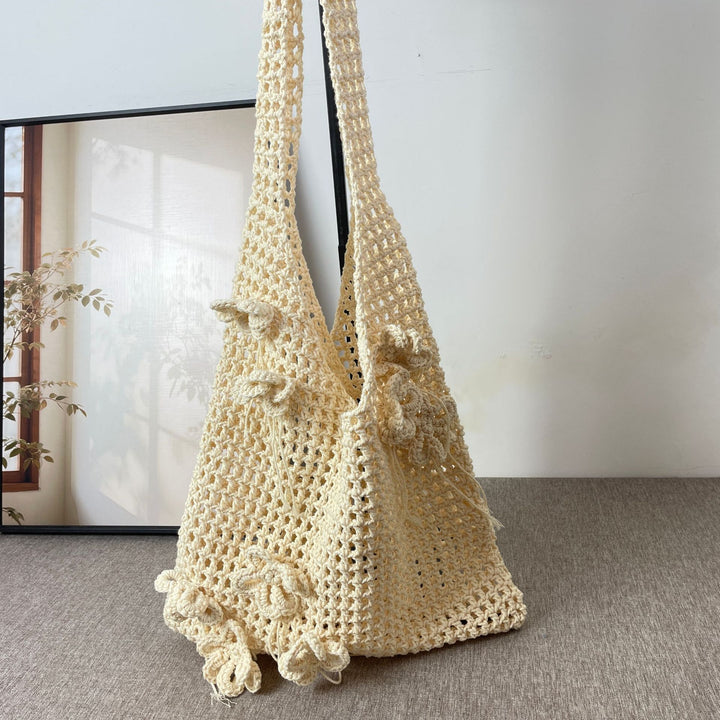 Hand-knotted beach bag with flower details Bowlift