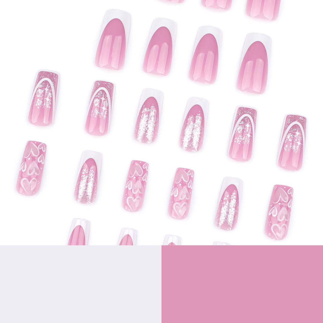 Artful Nail Extensions with Modern Glitter Design and Heart Accents Bowlift
