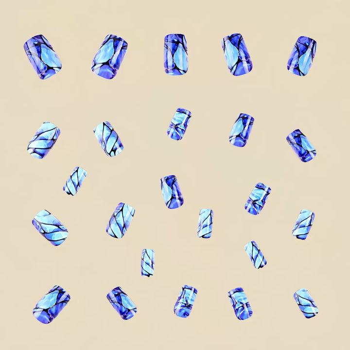 Acrylic nail set with luxurious marble design and elegant accents Bowlift