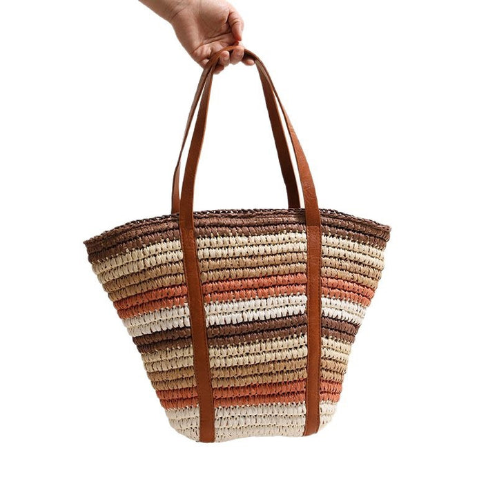 Braided straw tote bag with sturdy leather handles Bowlift
