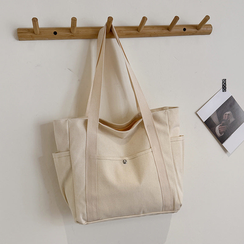 Everyday tote with practical compartments Bowlift