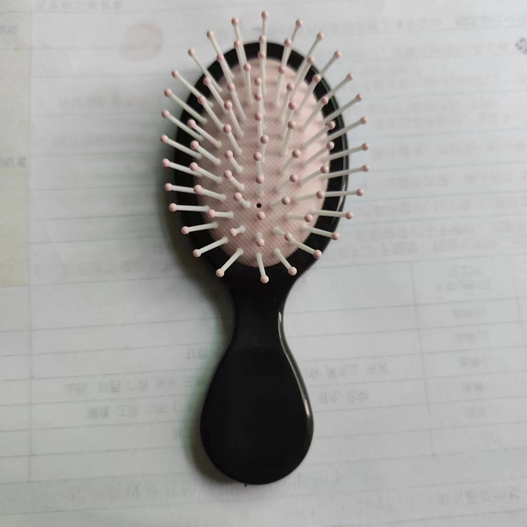 Hair comb with ergonomic handle Bowlift