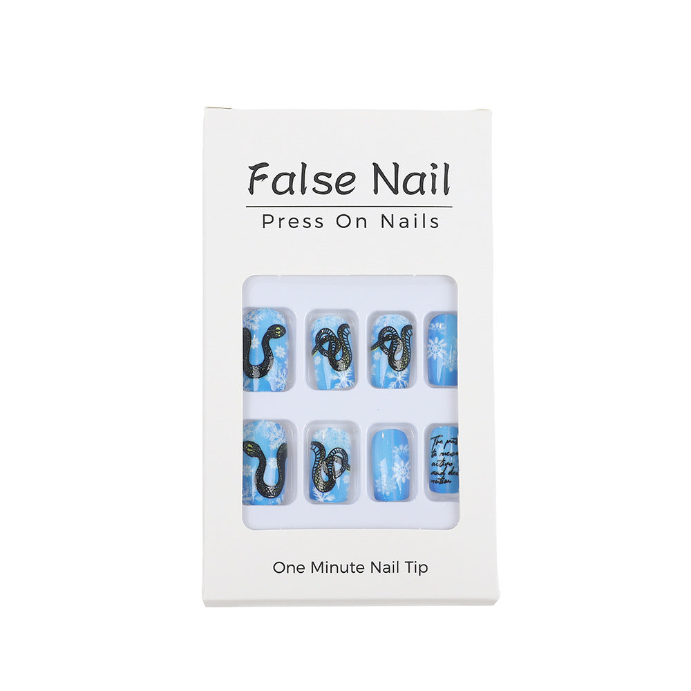Creative art nails with snowflake and snake motif Bowlift