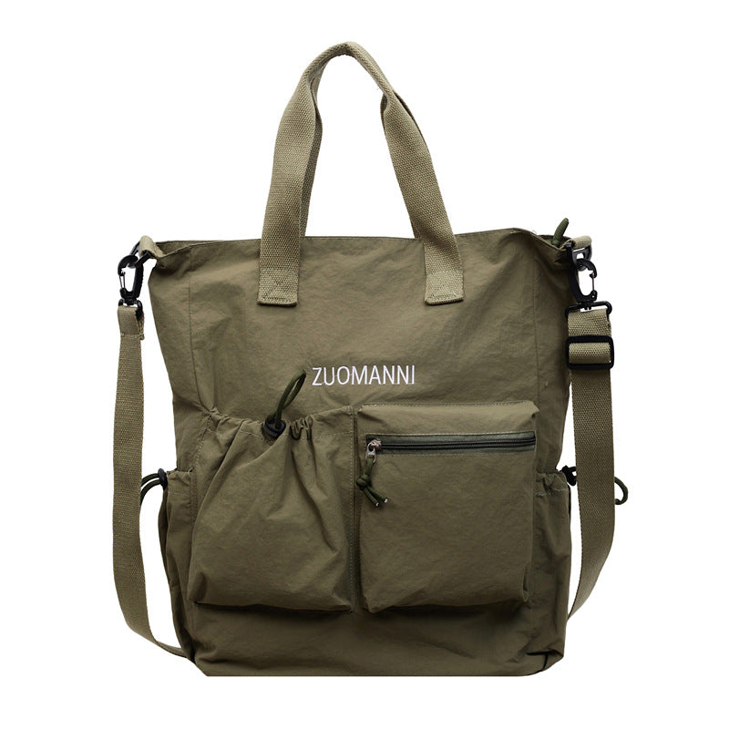 Tote bag with multifunctional outer pockets and adjustable shoulder strap Bowlift