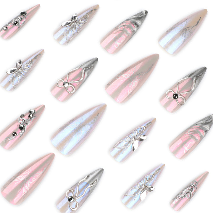 Artful stiletto nails with delicate silver casting decoration Bowlift