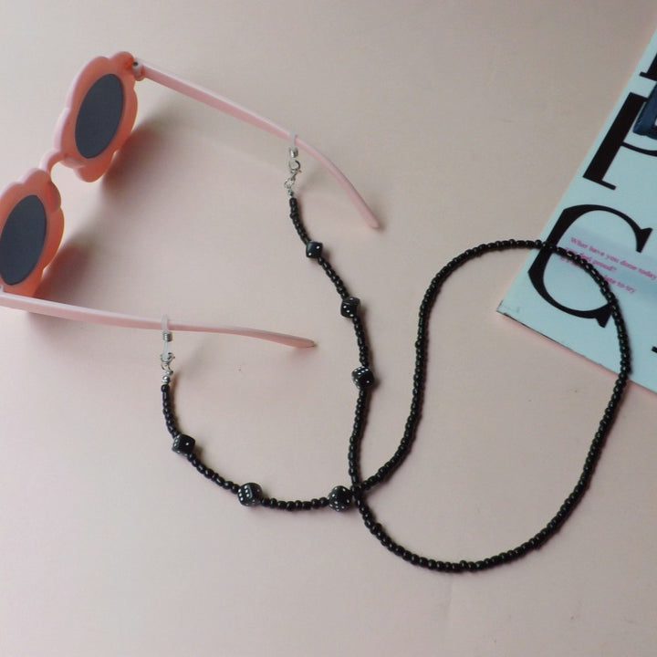 Sunglasses with fashionable pearl band Bowlift