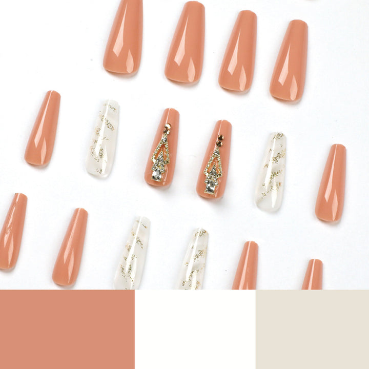 Artful nail extensions with glitter embellishments and delicate accents Bowlift